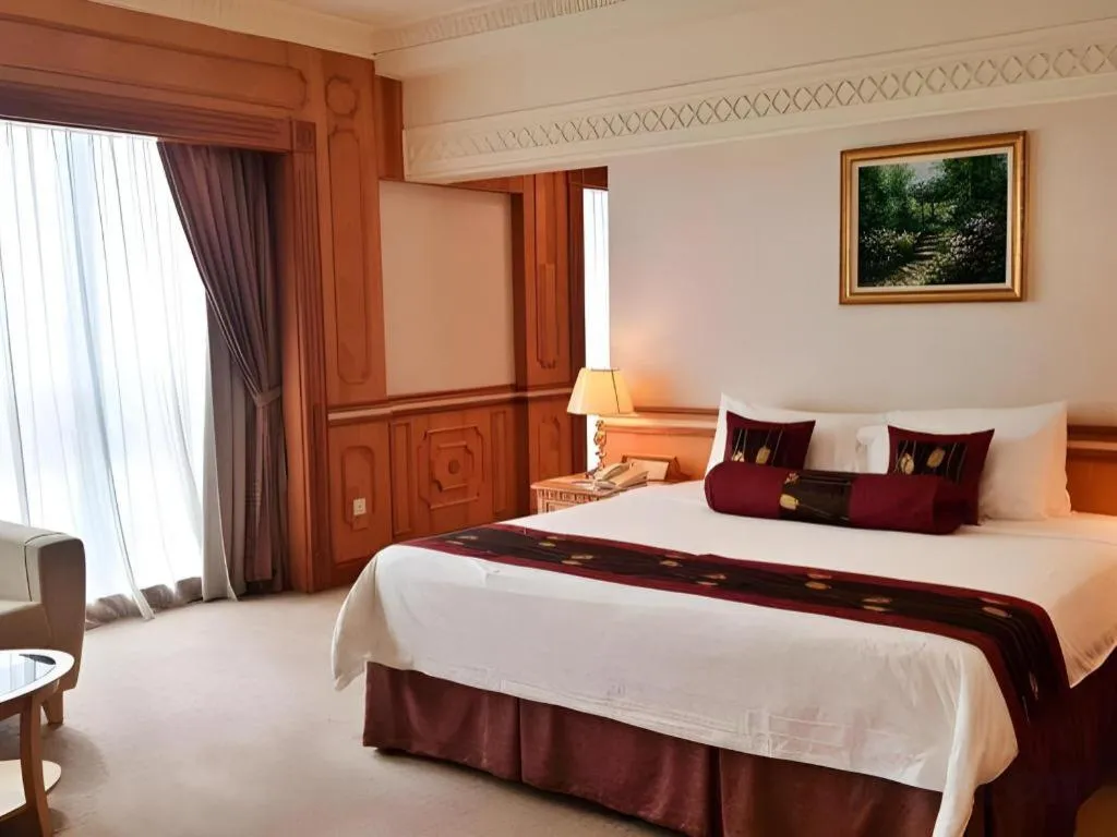 Bed in The Rizqun International Hotel