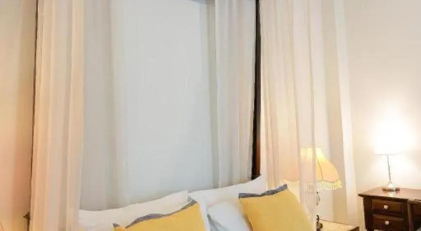 Bed in Baan Klang Wiang Hotel