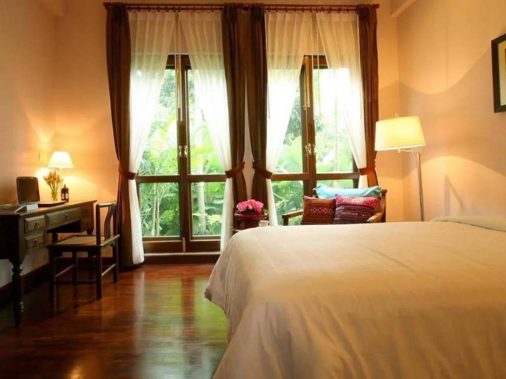 Bed in Baan Klang Wiang Hotel