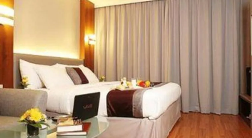 Bed in Grand Cemara Hotel