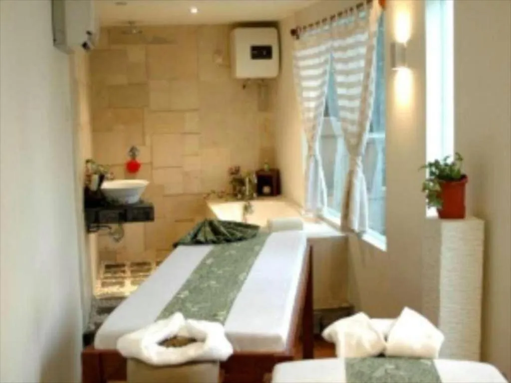 Bed in Grand Cemara Hotel