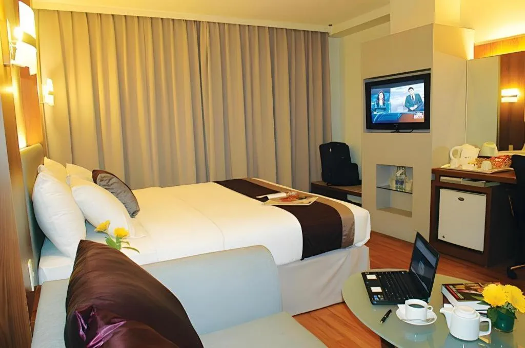 Bed in Grand Cemara Hotel