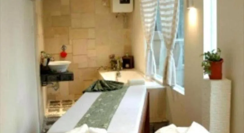 Bed in Grand Cemara Hotel