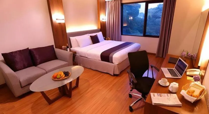 Bed in Grand Cemara Hotel