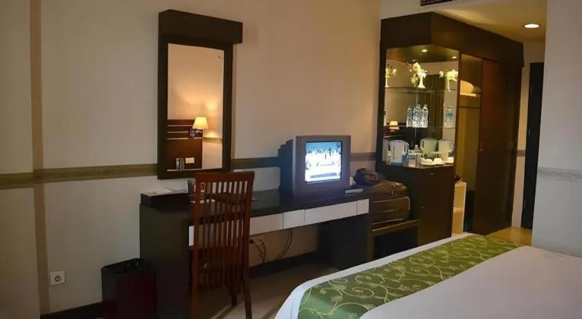 Bed in Grand Antares Hotel