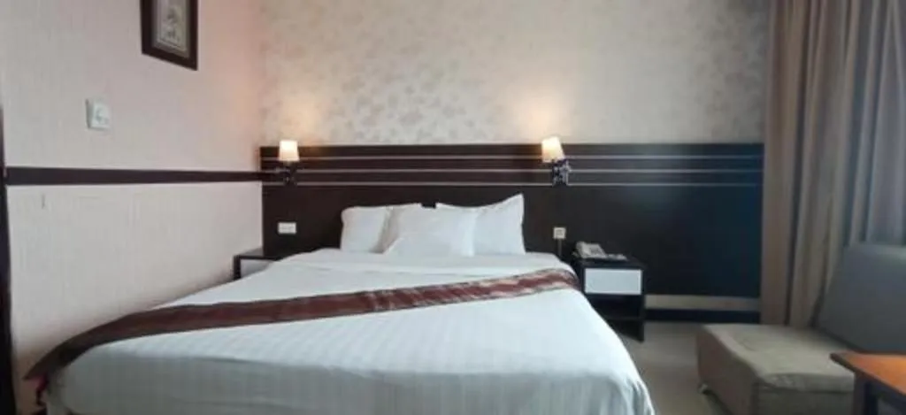 Bed in Grand Antares Hotel