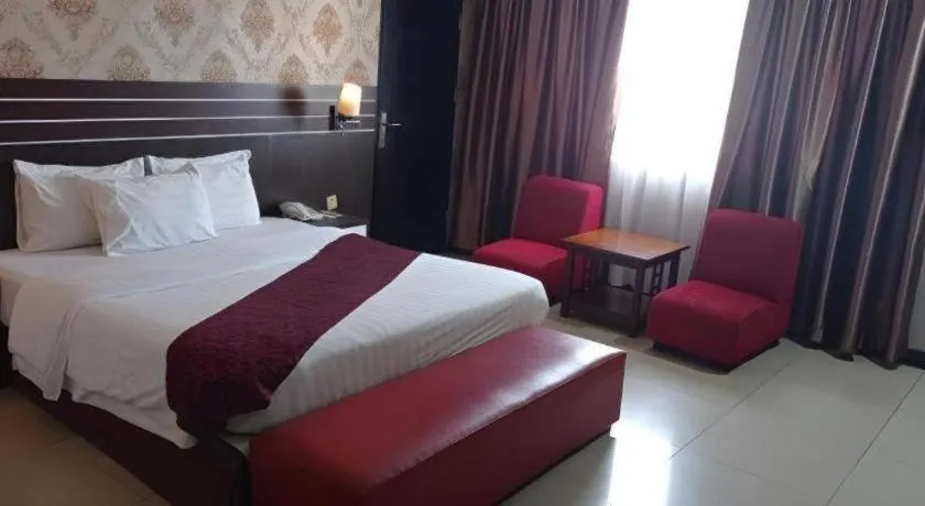 Bed in Grand Antares Hotel