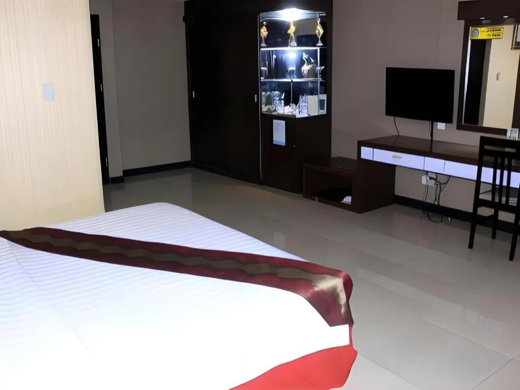 Bed in Grand Antares Hotel