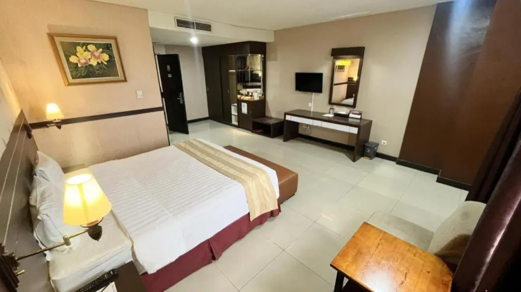 Bed in Grand Antares Hotel