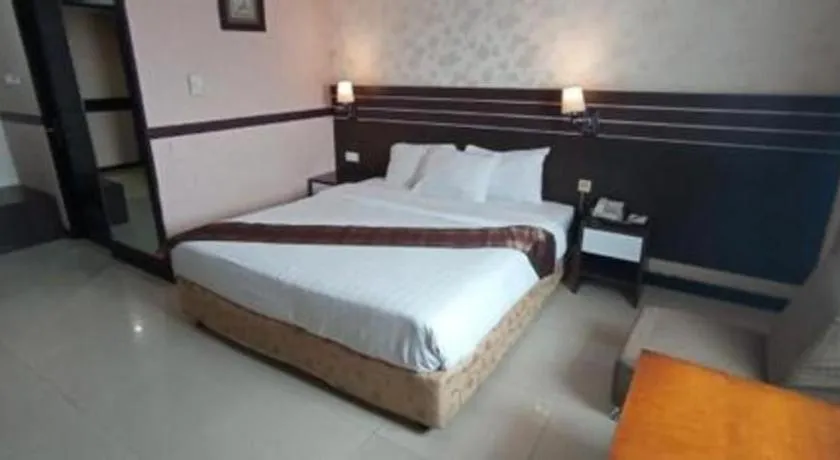 Bed in Grand Antares Hotel