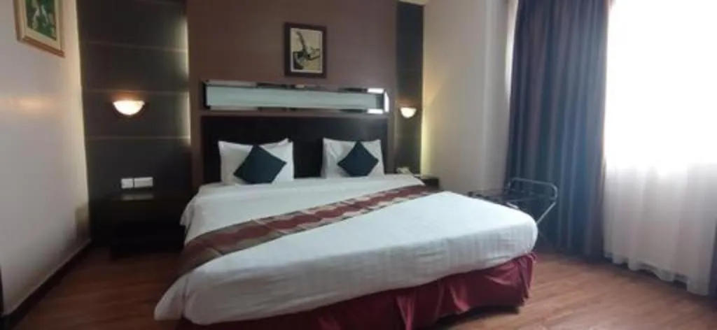 Bed in Grand Antares Hotel