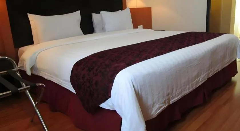 Bed in Grand Antares Hotel