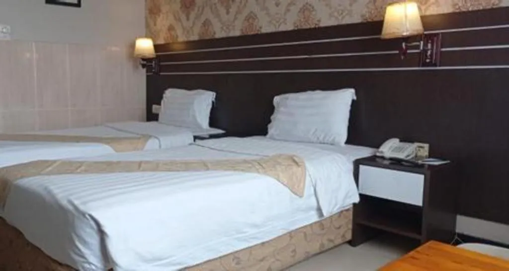 Bed in Grand Antares Hotel
