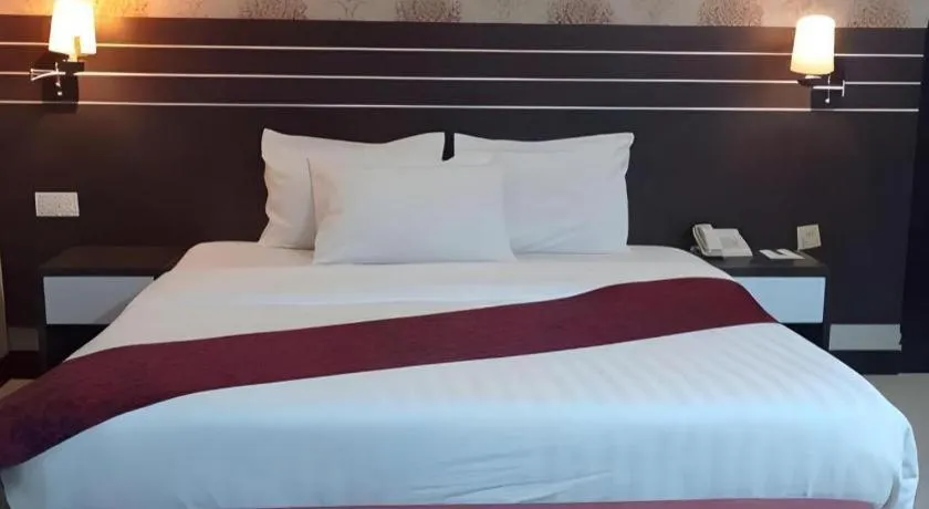 Bed in Grand Antares Hotel