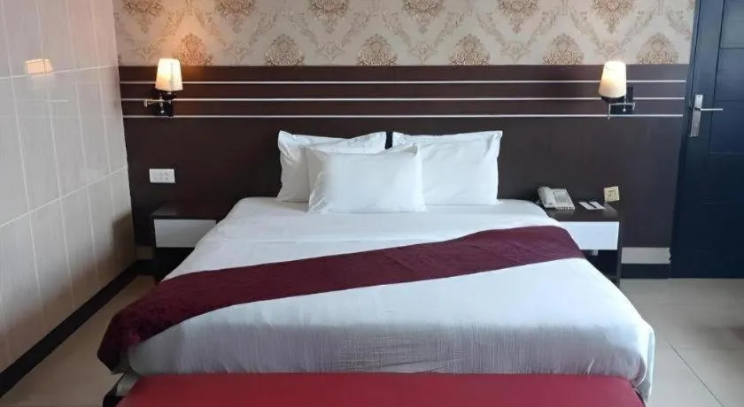 Bed in Grand Antares Hotel