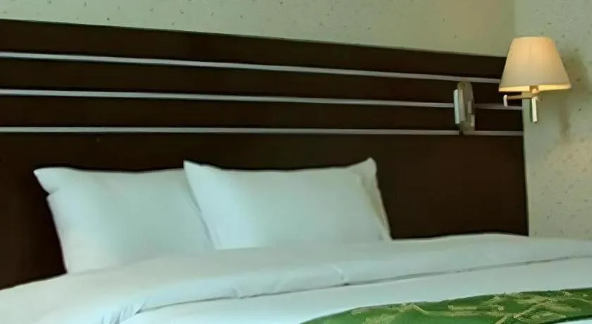 Bed in Grand Antares Hotel
