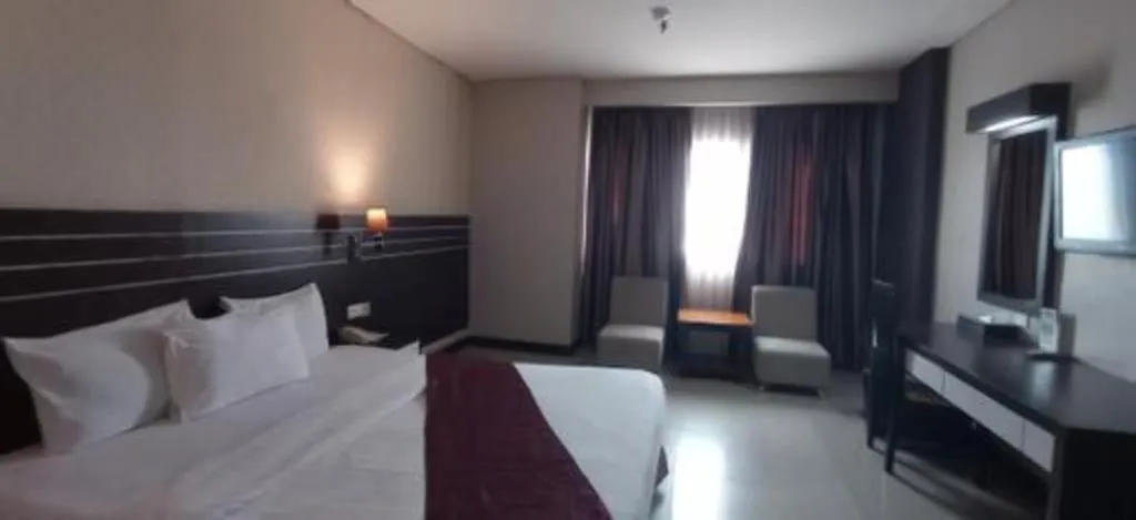 Bed in Grand Antares Hotel
