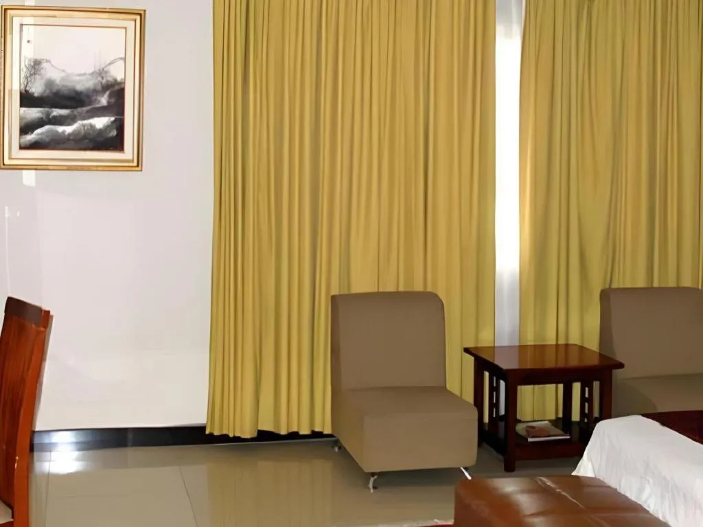 Bed in Grand Antares Hotel