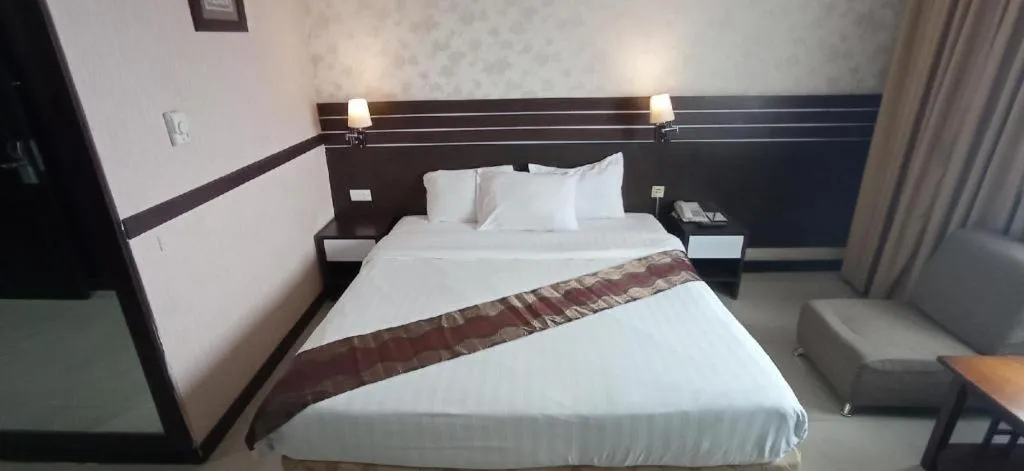 Bed in Grand Antares Hotel