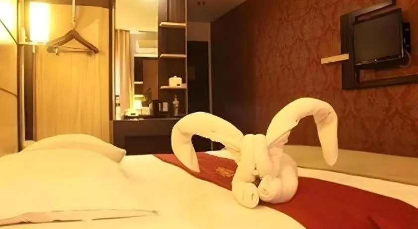 Bed in Travello Hotel Manado