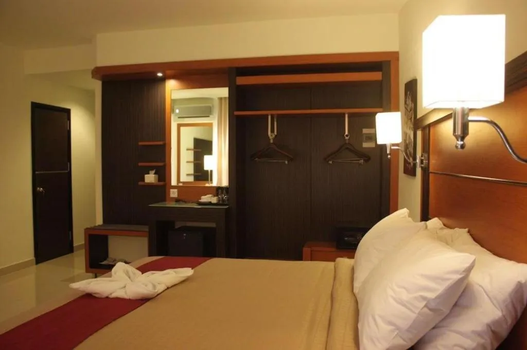 Bed in Travello Hotel Manado
