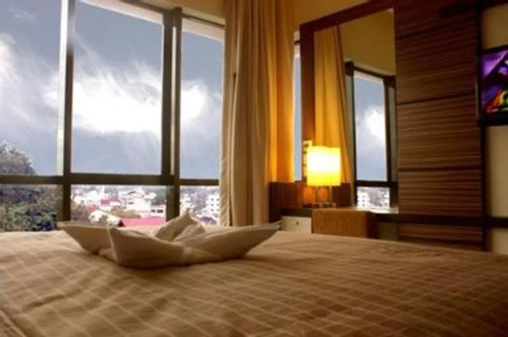 Bed in Travello Hotel Manado