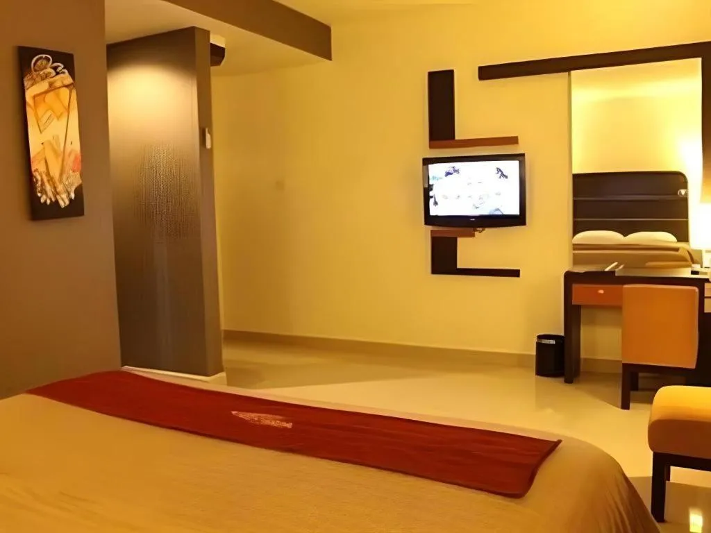 Bed in Travello Hotel Manado