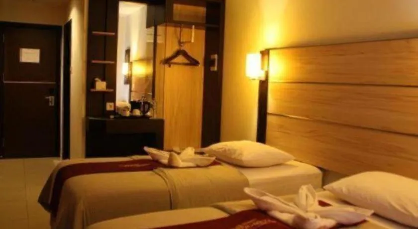 Bed in Travello Hotel Manado