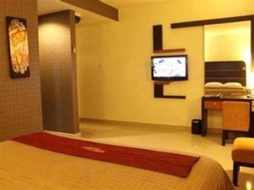 Bed in Travello Hotel Manado