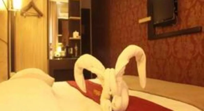 Bed in Travello Hotel Manado