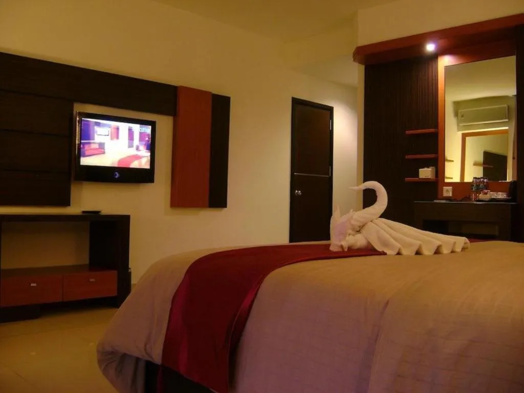 Bed in Travello Hotel Manado