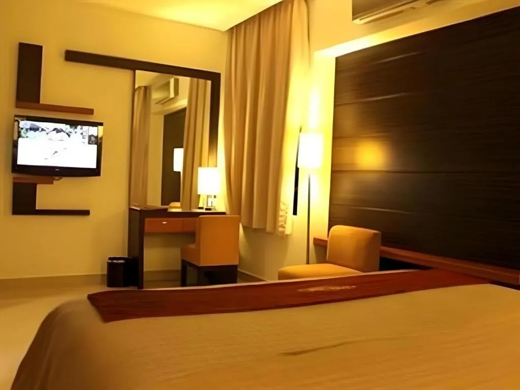 Bed in Travello Hotel Manado