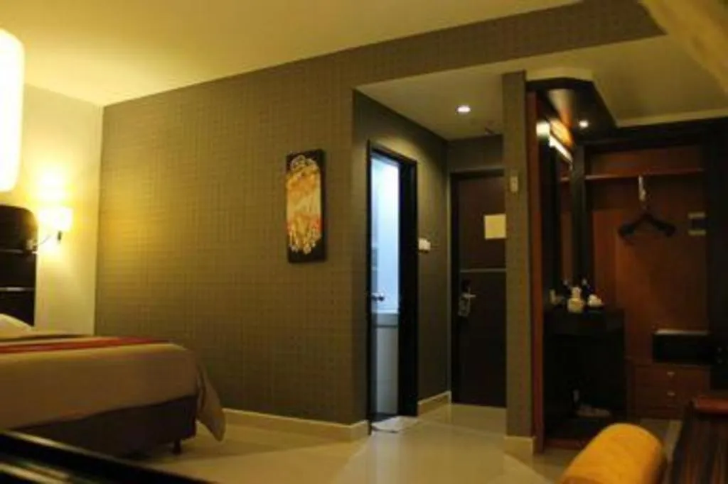 Bed in Travello Hotel Manado