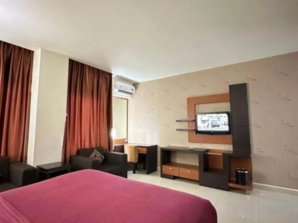 Bed in Travello Hotel Manado