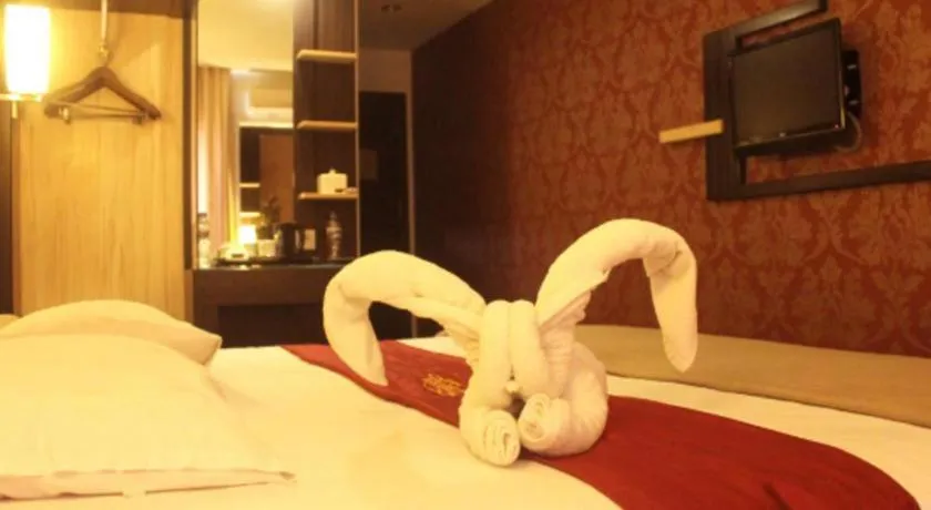 Bed in Travello Hotel Manado