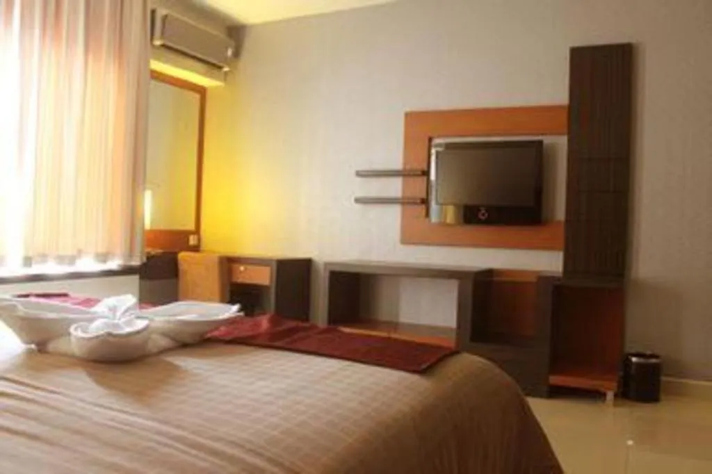 Bed in Travello Hotel Manado