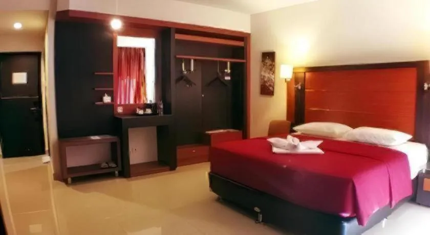 Bed in Travello Hotel Manado