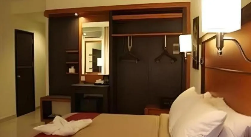 Bed in Travello Hotel Manado