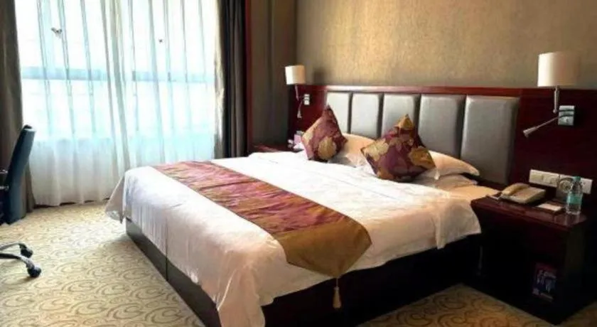 Bed in Fujian Galaxy Garden Hotel