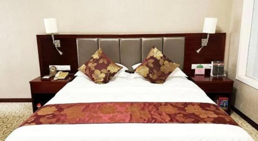 Bed in Fujian Galaxy Garden Hotel