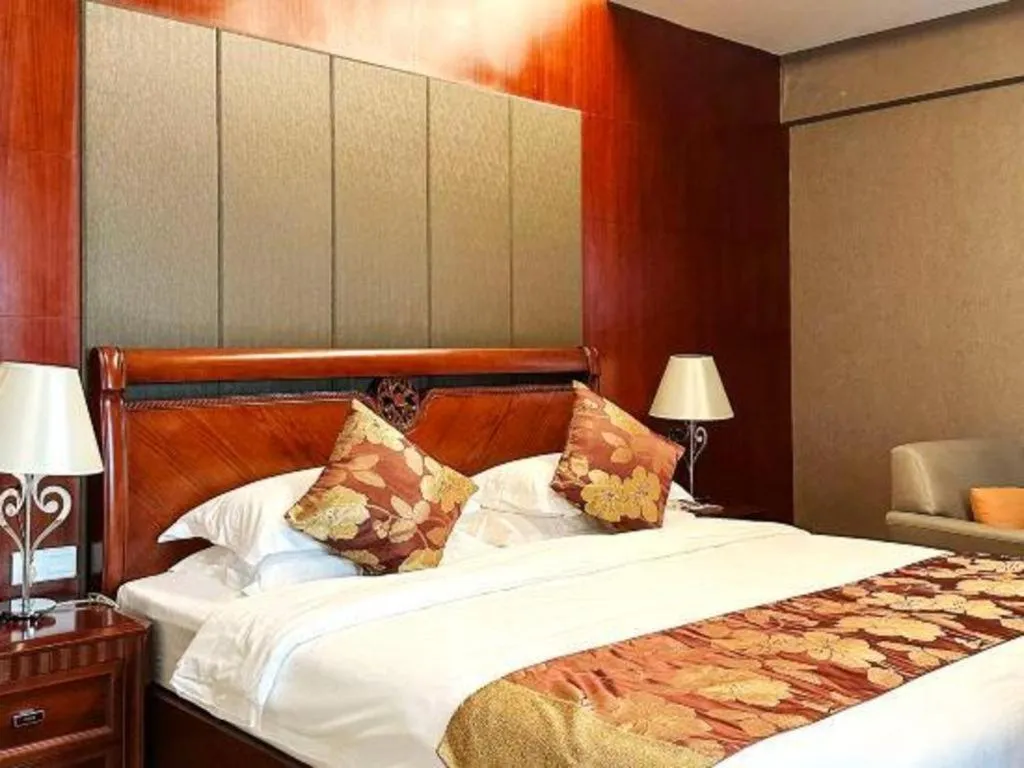 Bed in Fujian Galaxy Garden Hotel
