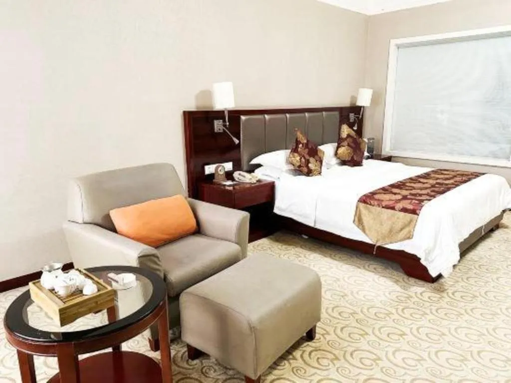 Bed in Fujian Galaxy Garden Hotel