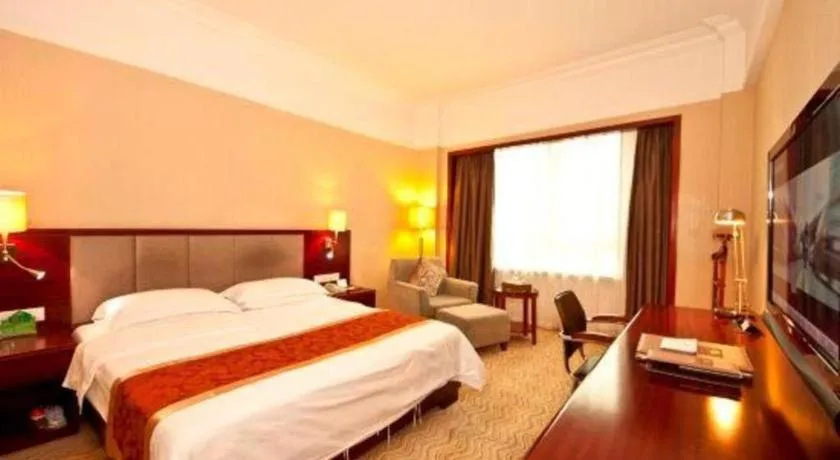 Bed in Fujian Galaxy Garden Hotel