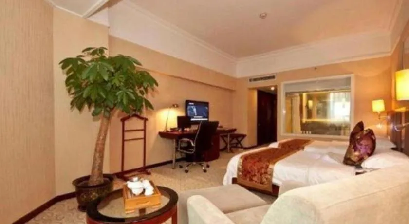 Bed in Fujian Galaxy Garden Hotel