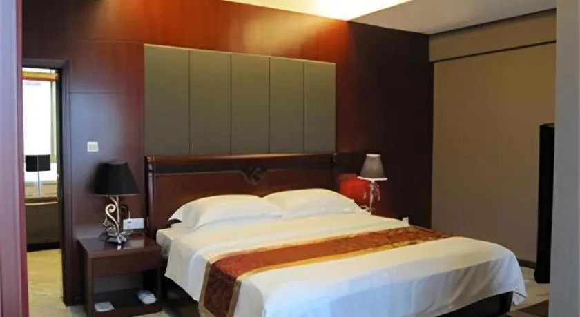 Bed in Fujian Galaxy Garden Hotel