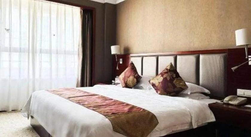 Bed in Fujian Galaxy Garden Hotel