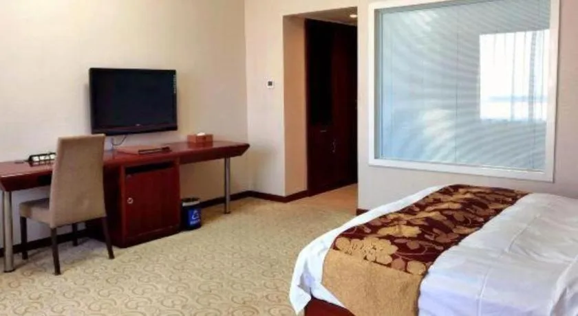 Bed in Fujian Galaxy Garden Hotel