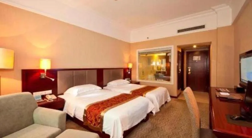 Bed in Fujian Galaxy Garden Hotel