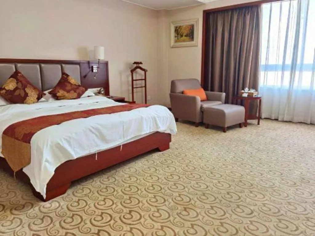 Bed in Fujian Galaxy Garden Hotel