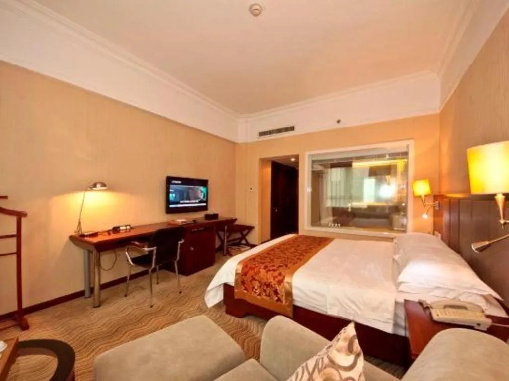 Bed in Fujian Galaxy Garden Hotel